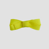 Sunshine yellow bow on a white background