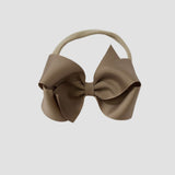 Taupe 4 inch bow on a nude nylon headband