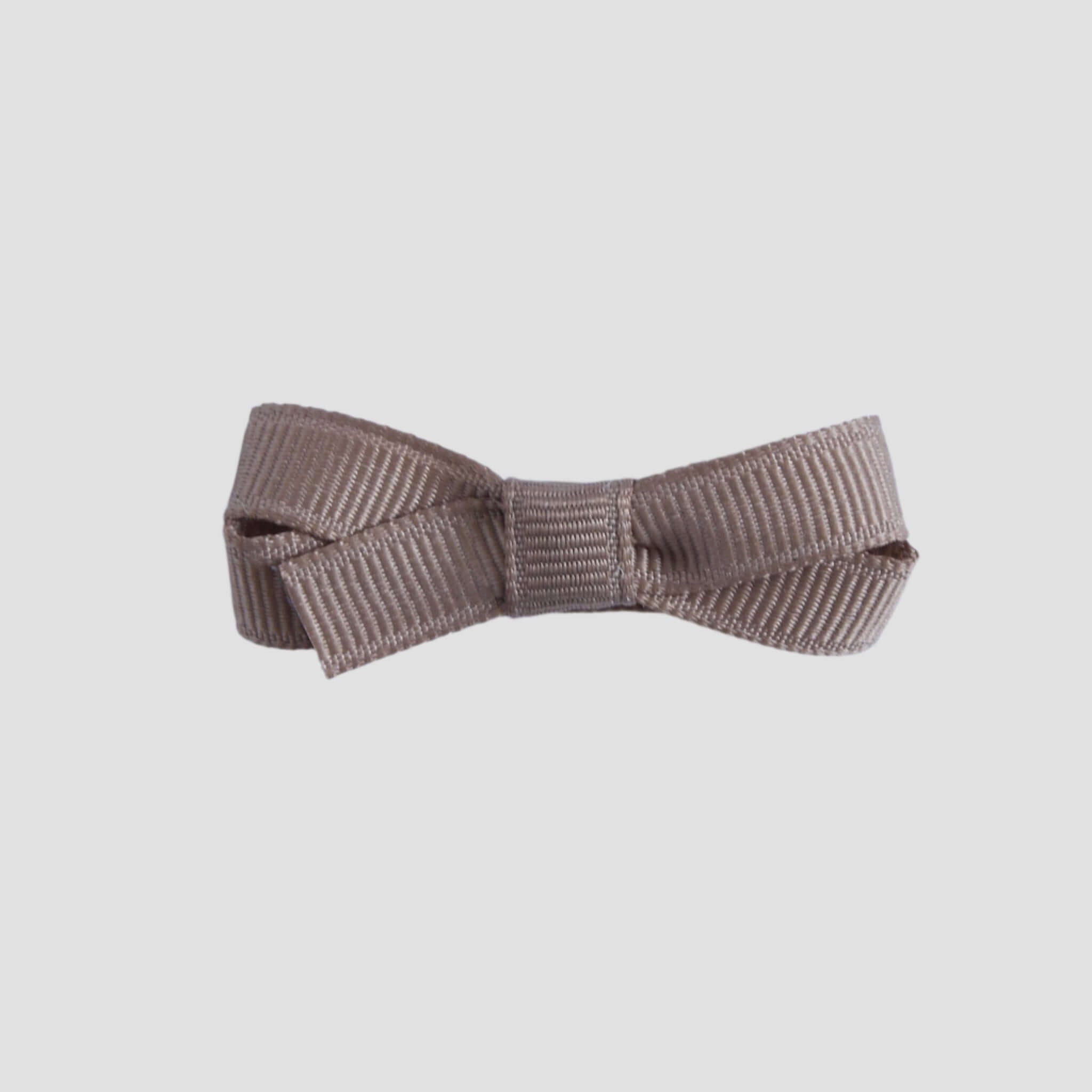 Taupe bow tie on a white background
