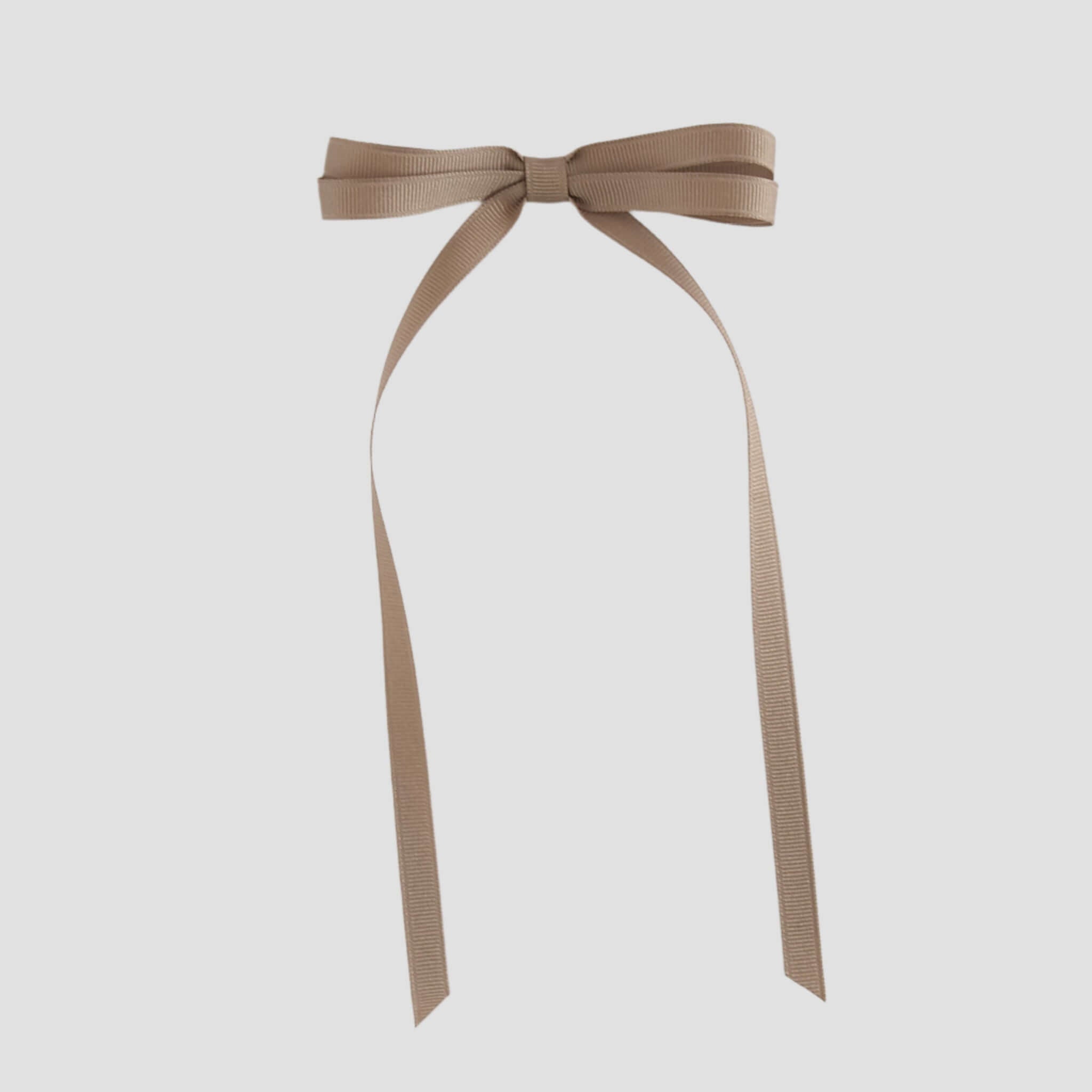 Taupe brown ribbon bow on a white background