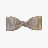 Ava satin bow in taupe on a white background