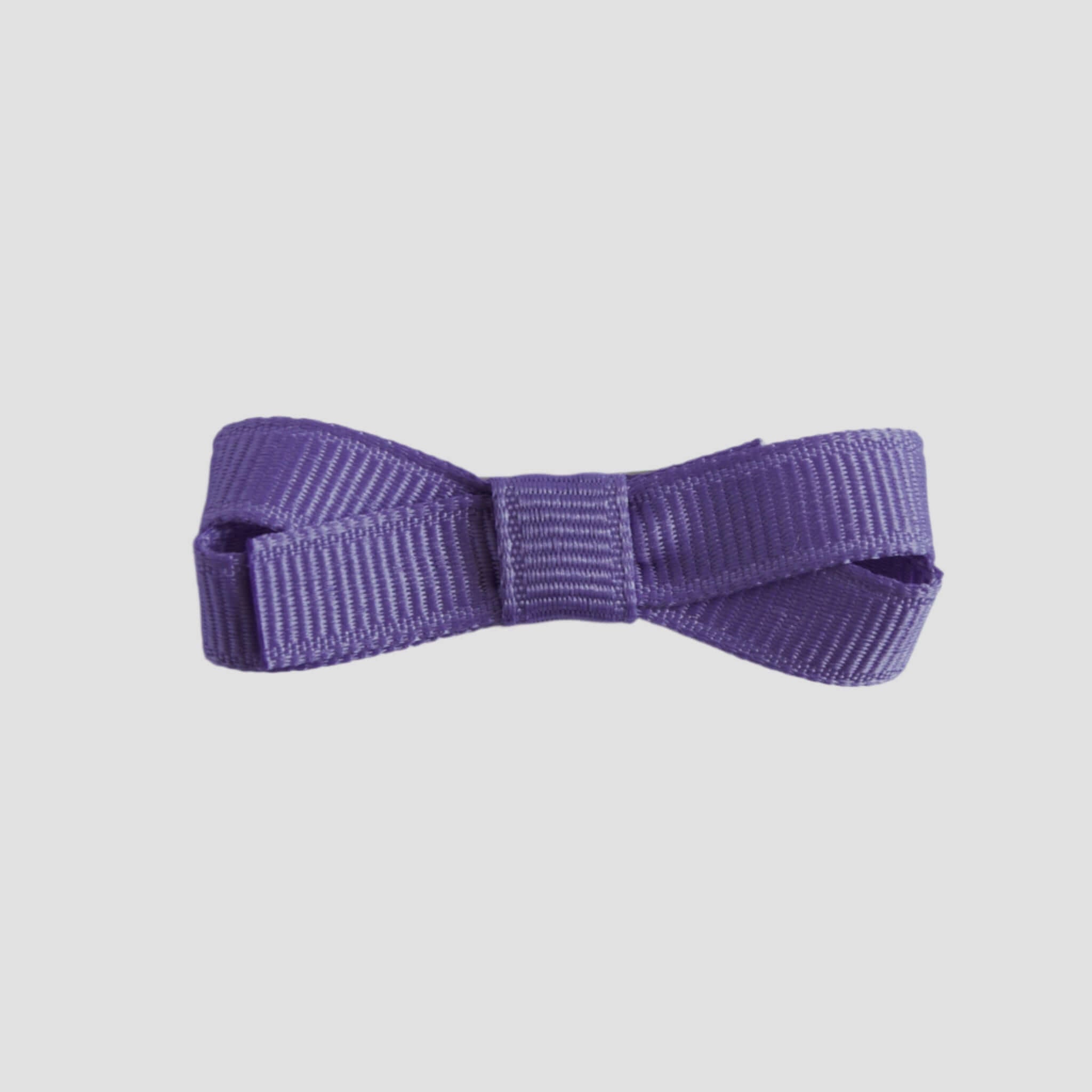 Tropic lilac bow on a white background