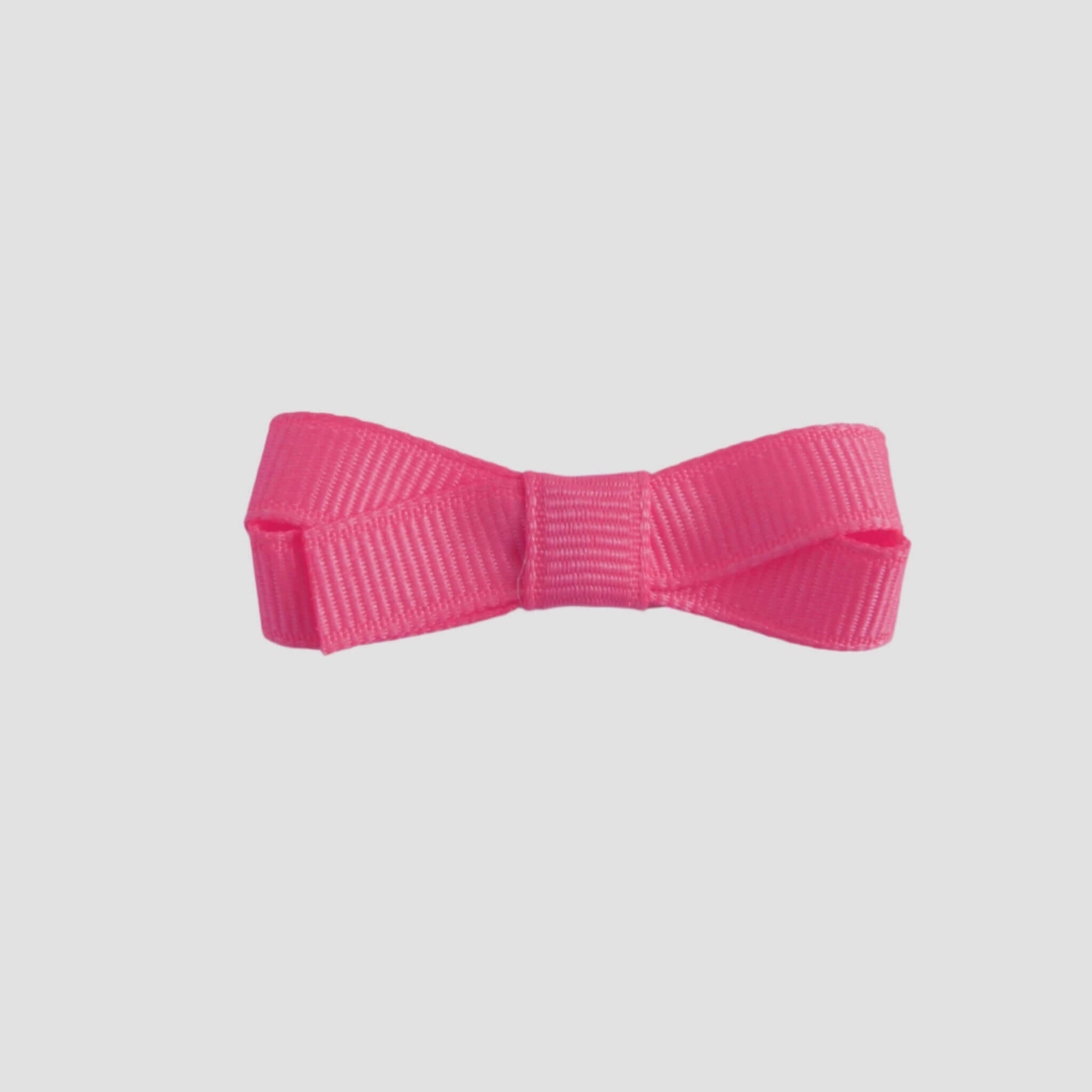 hot pink bow on a white background