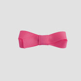 hot pink bow on a white background