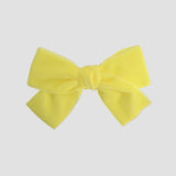 Velvet Kayla in light yellow on a white background