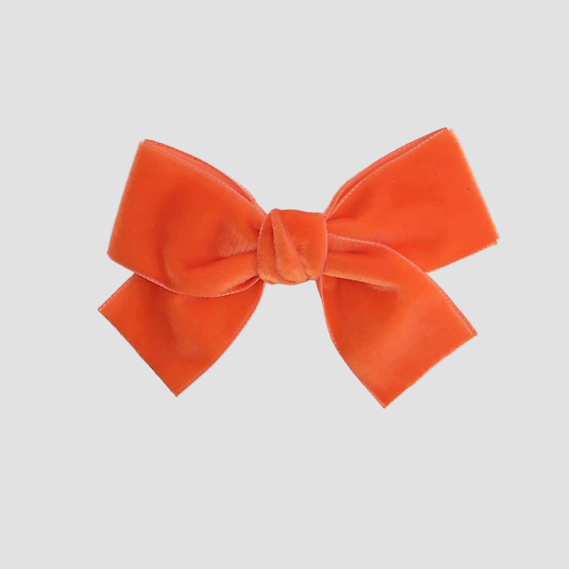 Velvet Kayla in orange on a white background