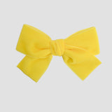 Velvet Kayla in yellow on a white background