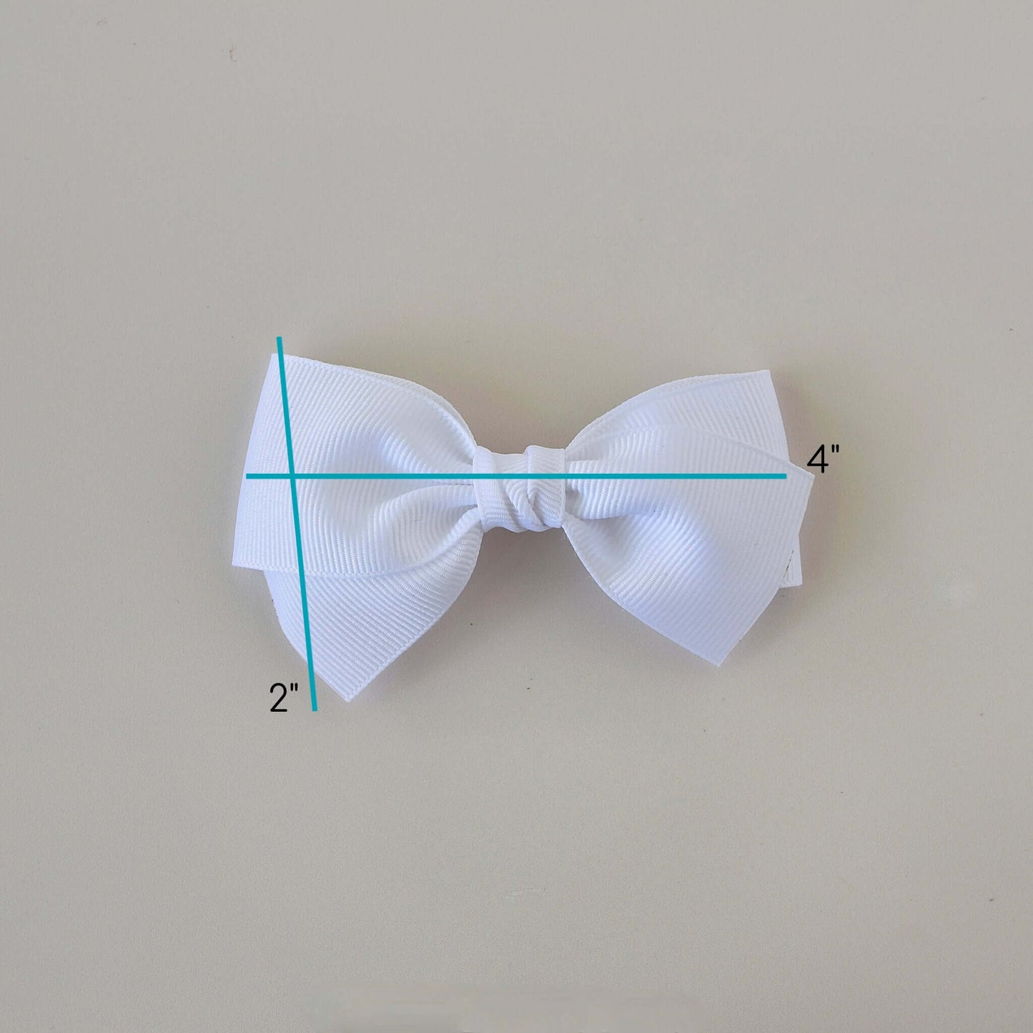 4 inch white grosgrain baby Kayla bow clip showing dimensions, perfect for toddlers and newborns, versatile accessory for headbands or clips