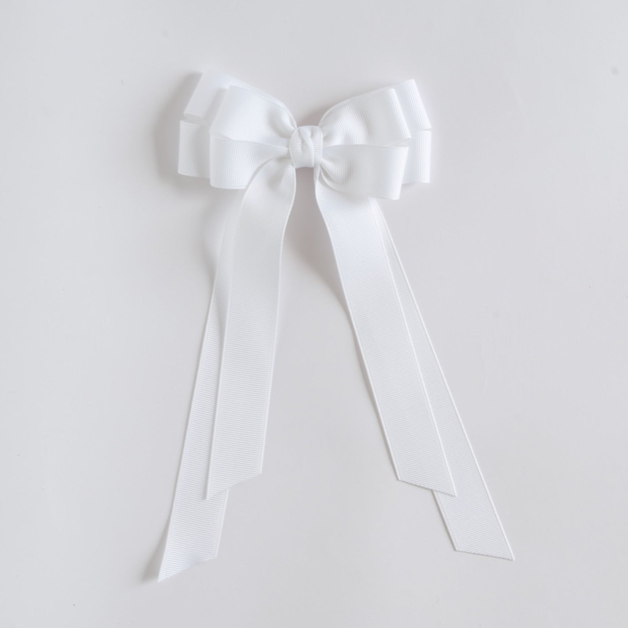 White bow on a white background