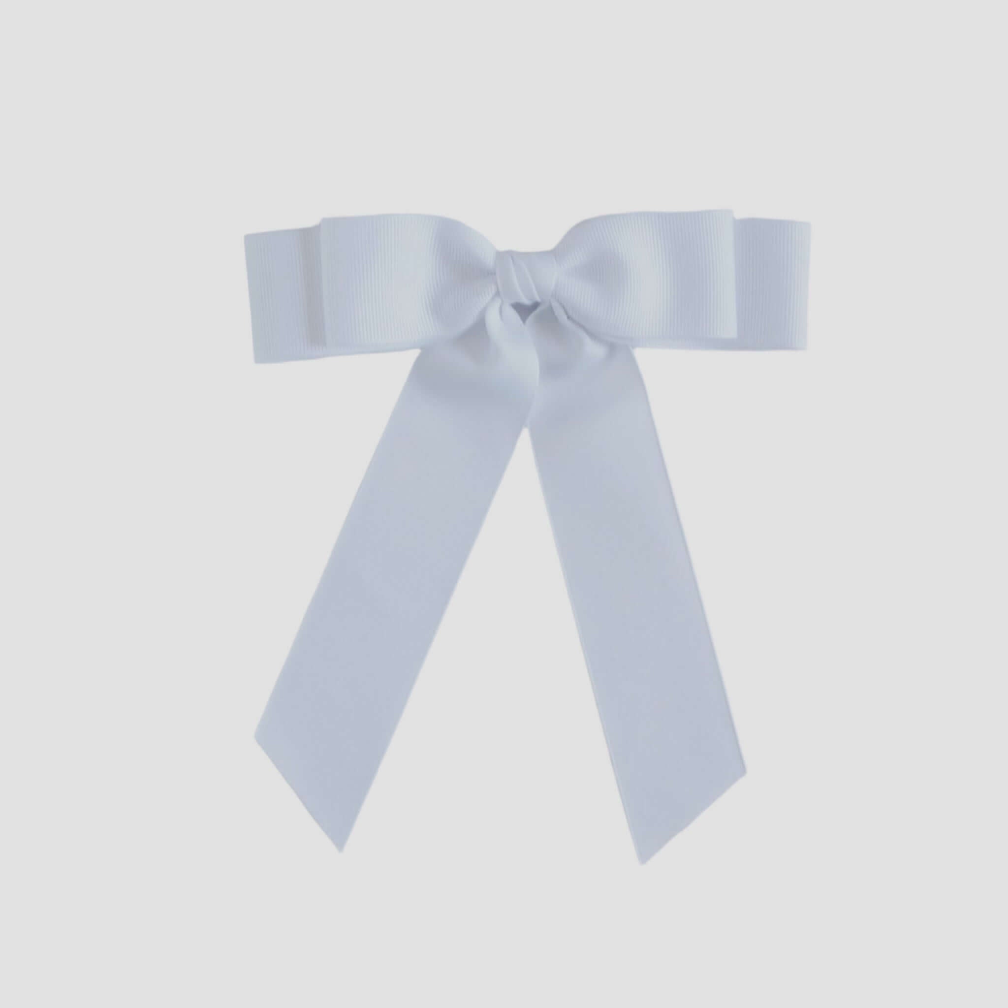 White bow tie on a white background