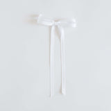 White ribbon bow on a white background