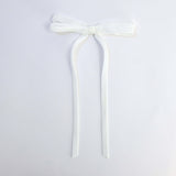 white Olivia velvet hair bow for women with long tails on white background