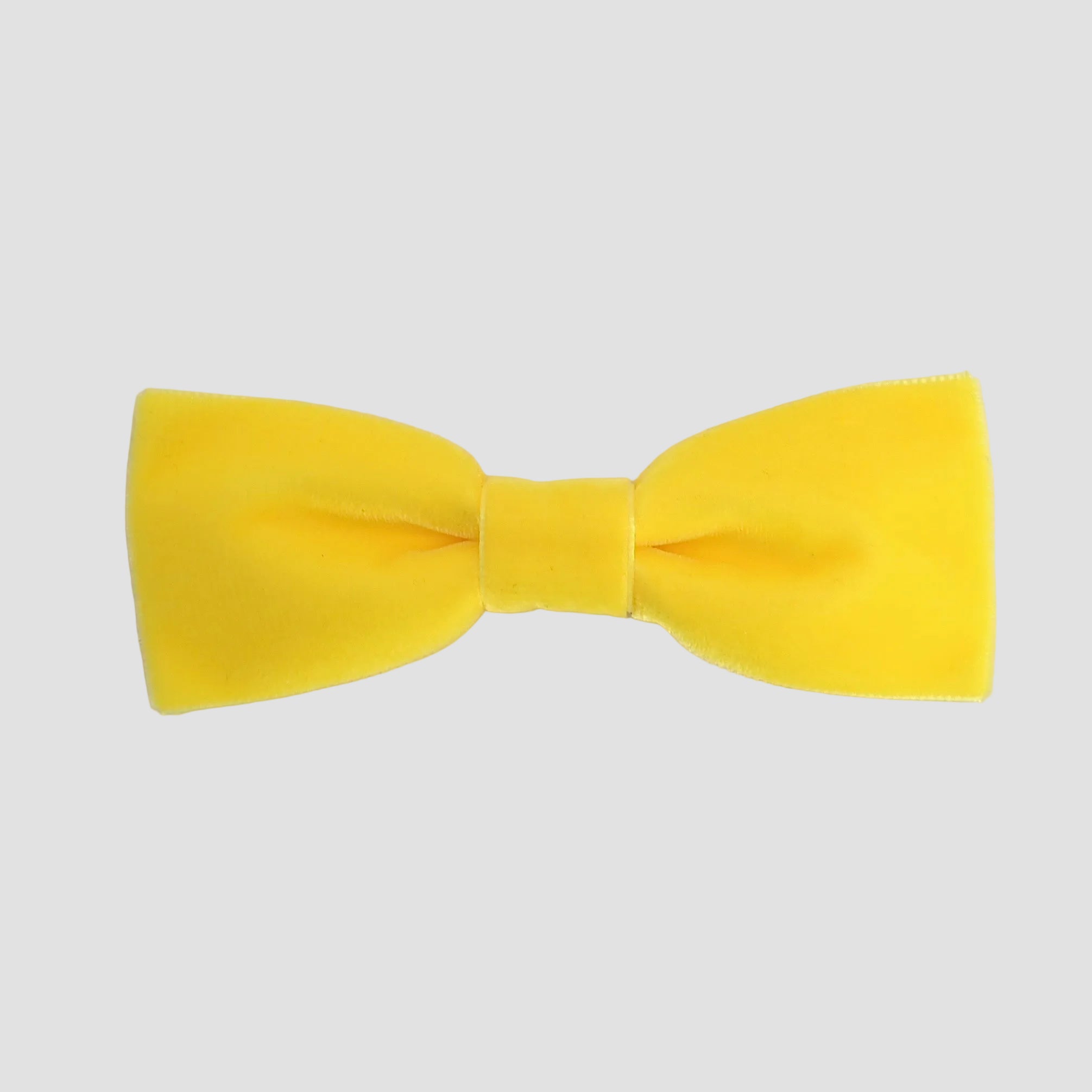 Yellow men bow tie on a white background.