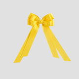 Yellow bow on a white  background