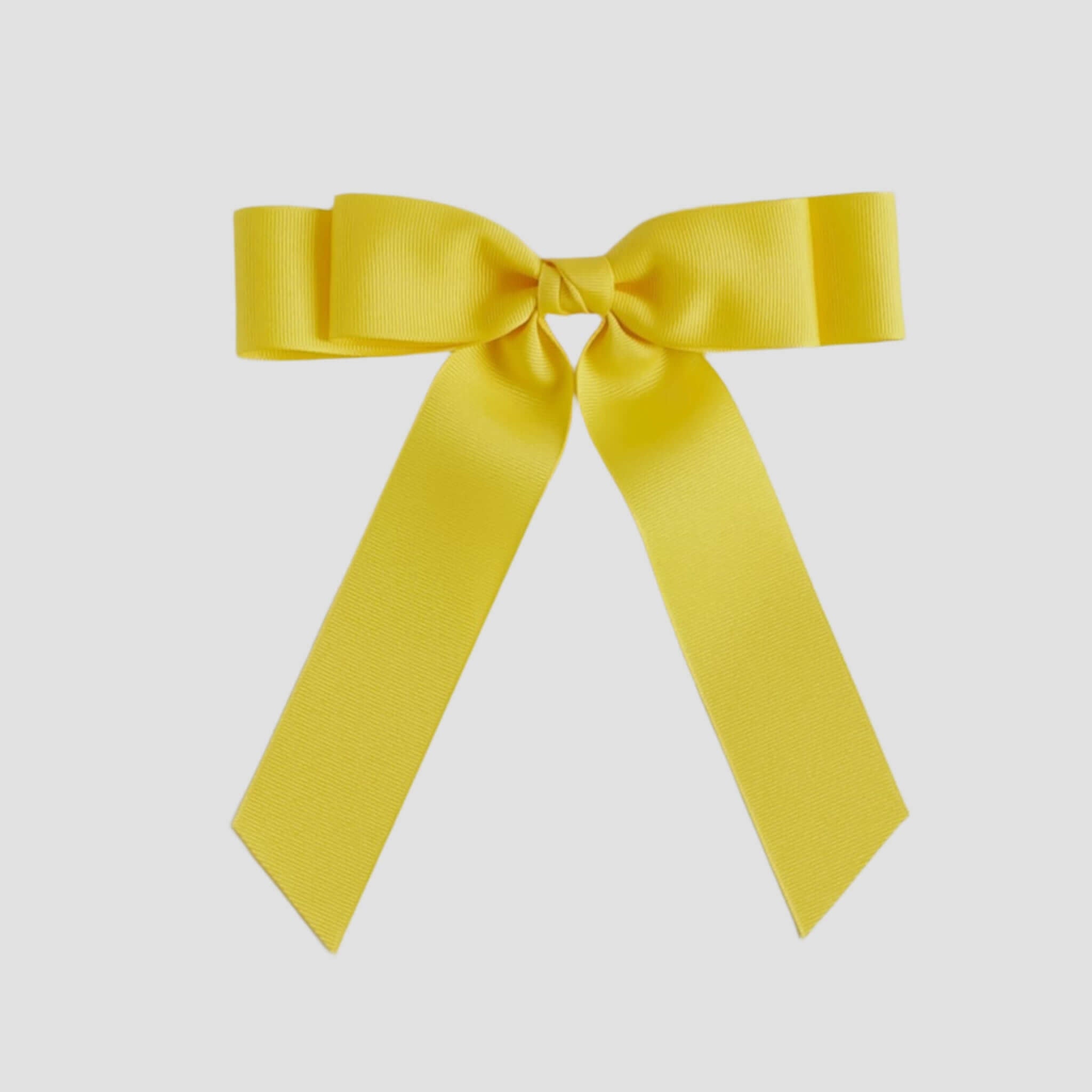 Yellow bow on a white background